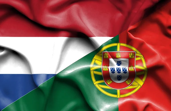 Bandera ondeante de Portugal y Países Bajos —  Fotos de Stock