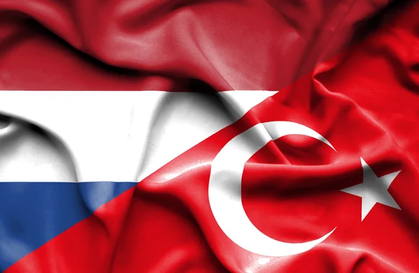 Turkiet och Nederländerna viftande flagga — Stockfoto