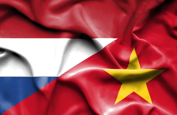 Bandeira ondulada do Vietnã e Países Baixos — Fotografia de Stock