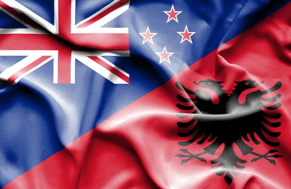 Bandera ondeante de Albania y Nueva Zelanda —  Fotos de Stock