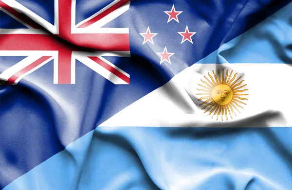 Waving flag of Argentina and New Zealand — Stock Photo, Image