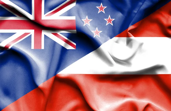 Waving flag of Austria and New Zealand — Stock Photo, Image