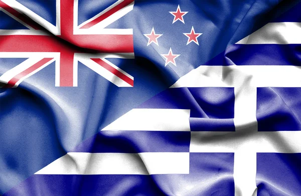 Waving flag of Greece and New Zealand — Stock Photo, Image