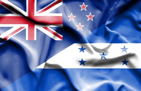 Wapperende vlag van honduras en Nieuw-Zeeland — Stockfoto