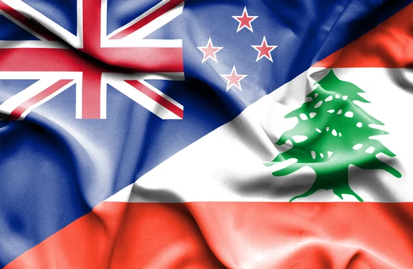Waving flag of Lebanon and New Zealand — Stock Photo, Image