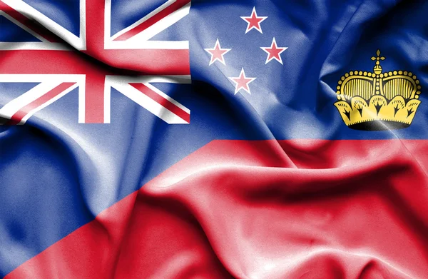 Waving flag of Lichtenstein and New Zealand — Stock Photo, Image