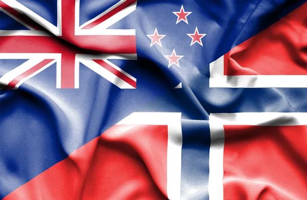 Waving flag of Norway and New Zealand — Stock Photo, Image