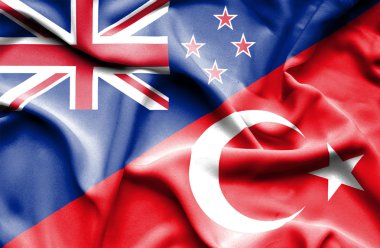 Türkiye ve Yeni Zelanda bayrağı sallayarak