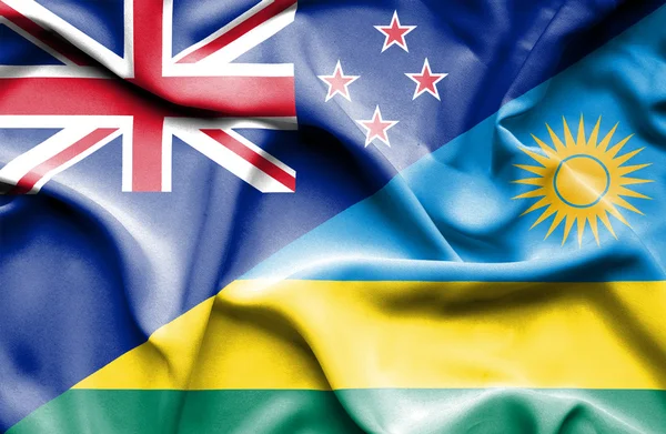 卢旺达和新西兰那飘扬的旗帜 — 图库照片
