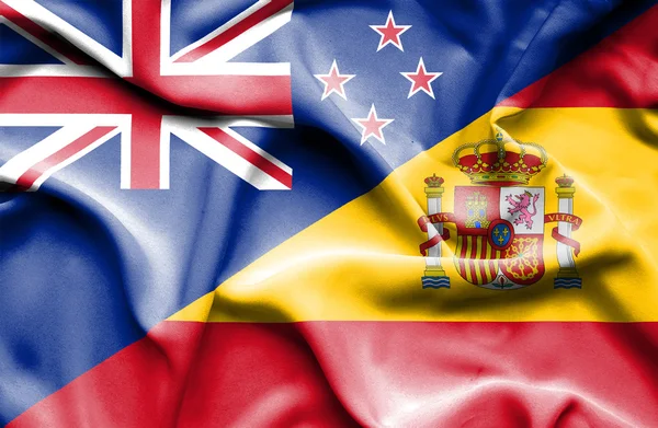 Waving flag of Spain and New Zealand — Stock Photo, Image