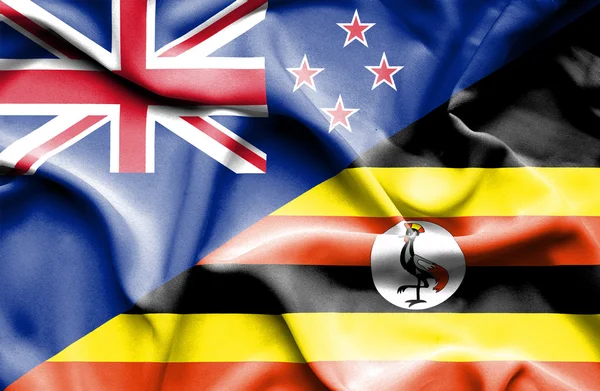 乌干达和新西兰那飘扬的旗帜 — 图库照片