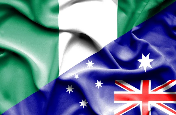 Wapperende vlag van Australië en nigeria — Stockfoto