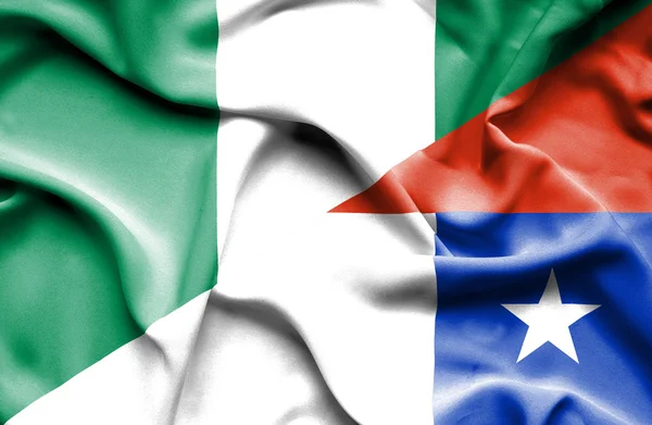 Bandeira acenando de Chile e Nigéria — Fotografia de Stock