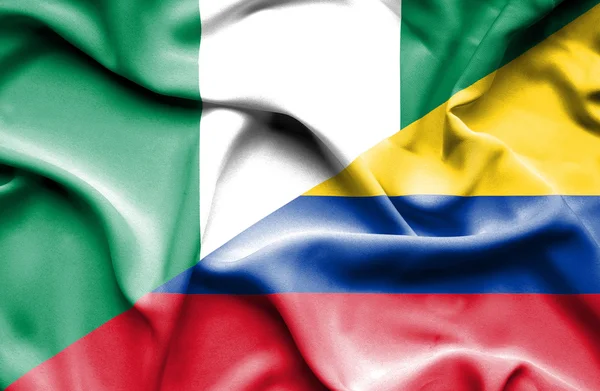 Macha flagą columbia i Nigerii — Zdjęcie stockowe