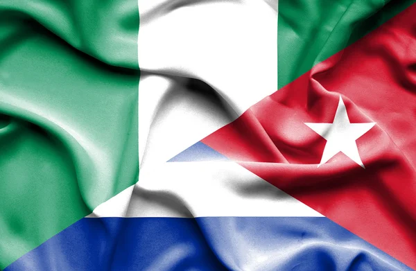 Waving flag of Cuba and Nigeria — Stock Photo, Image