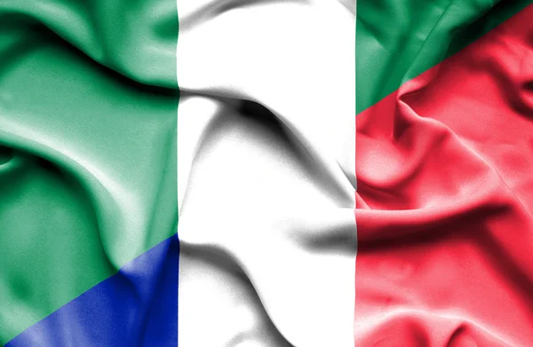 Waving flag of France and Nigeria — Stock Photo, Image