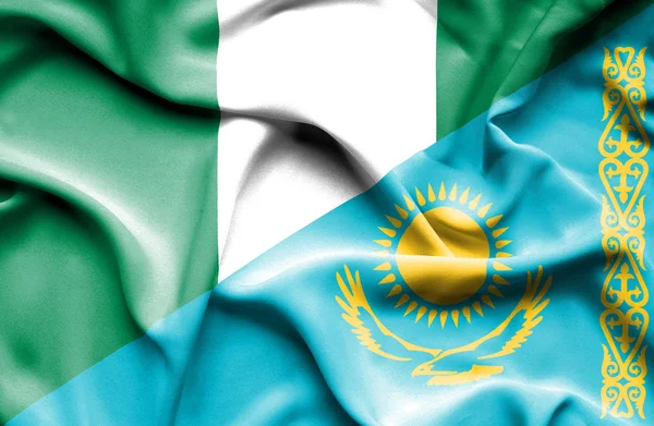 Waving flag of Kazakhstan and Nigeria — Stock Photo, Image