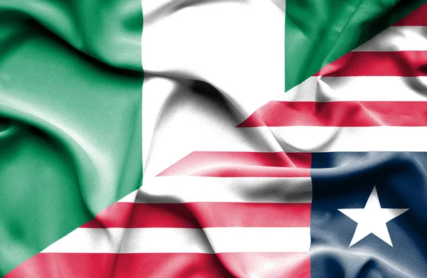 Ondeando la bandera de Liberia y Nigeria —  Fotos de Stock