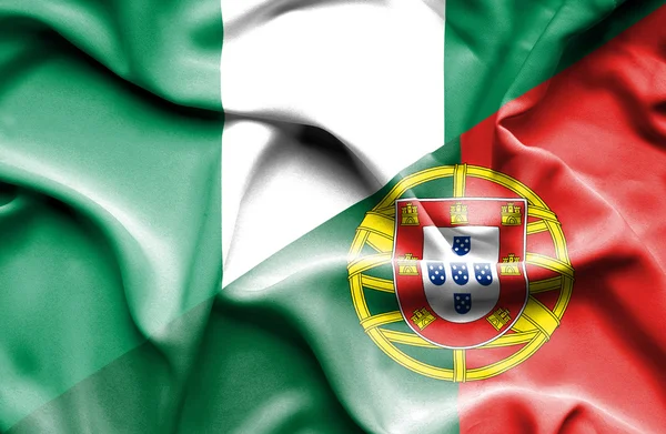 Bandera ondeante de Portugal y Nigeria — Foto de Stock