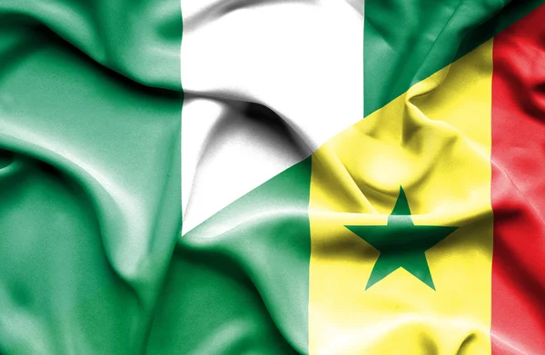 Waving flag of Senegal and Nigeria — Stock Photo, Image