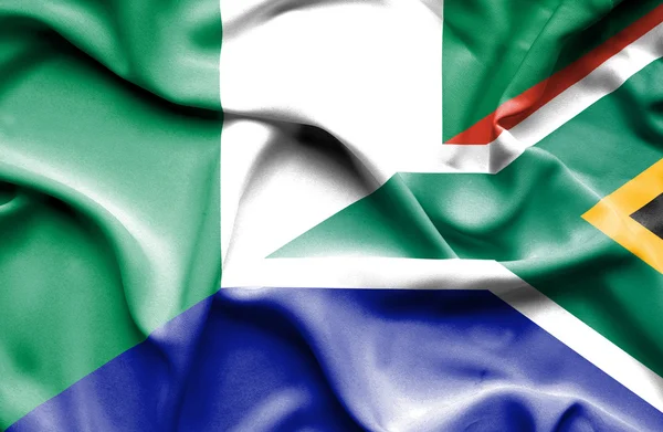 Sydafrika och nigeria viftande flagga — Stockfoto