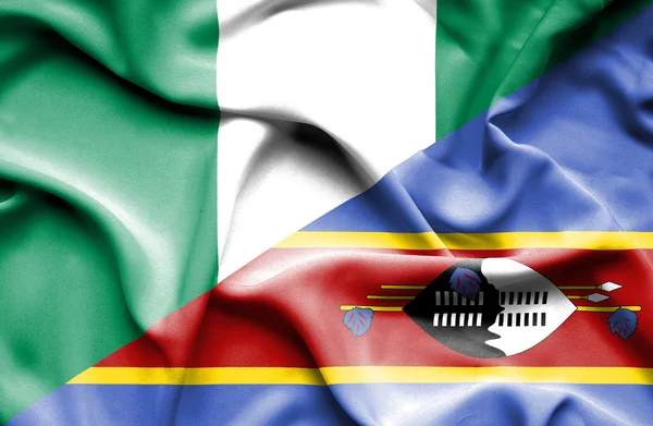Swazliand och nigeria viftande flagga — Stockfoto