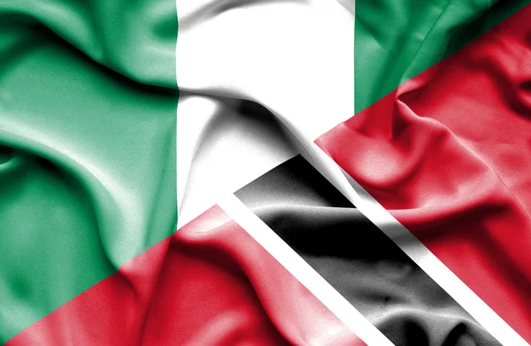 Waving flag of Trinidad and Tobago and Nigeria — Stock Photo, Image