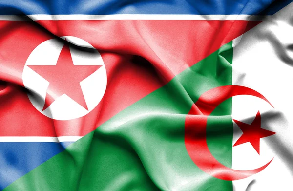 阿尔及利亚和朝鲜那飘扬的旗帜 — 图库照片