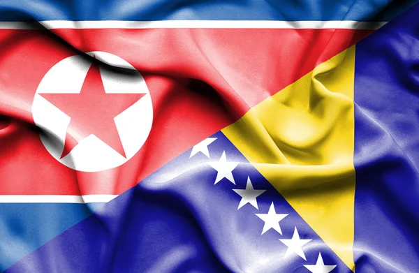 Bosnien och Hercegovina och Nordkorea viftande flagga — Stockfoto