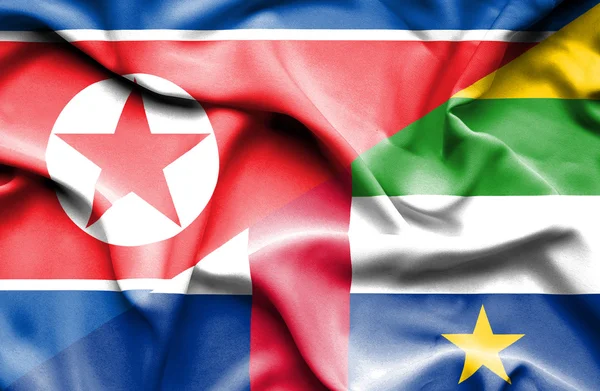 Flagge der Zentralafrikanischen Republik und Nordkoreas geschwenkt — Stockfoto