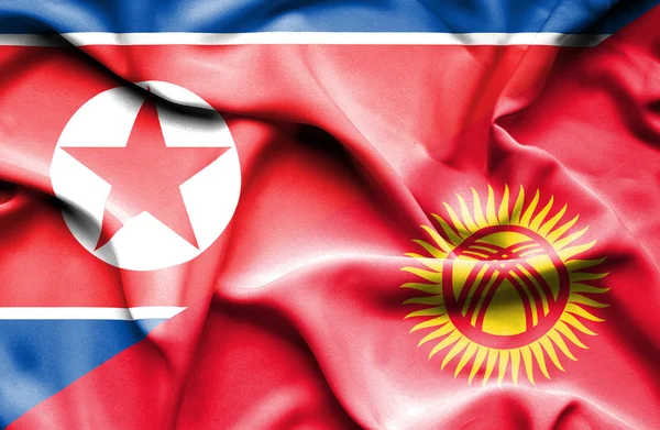 Sventolando bandiera del Kirghizistan e della Corea del Nord — Foto Stock