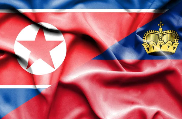 Waving flag of Lichtenstein and North Korea — Stock Photo, Image