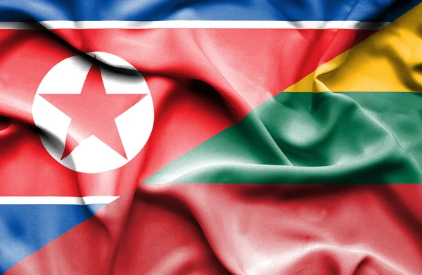Flagge Litauens und Nordkoreas schwenken — Stockfoto