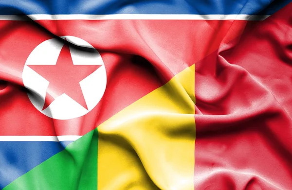 Waving flag of Mali and North Korea — Stock Photo, Image