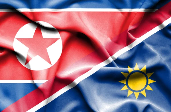 Flagge von Namibia und Nordkorea schwenken — Stockfoto