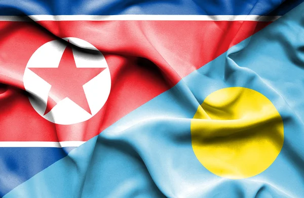 Bandiera sventolante di Palau e Corea del Nord — Foto Stock
