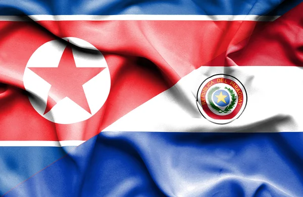 Bandeira ondulante do Paraguai e da Coreia do Norte — Fotografia de Stock