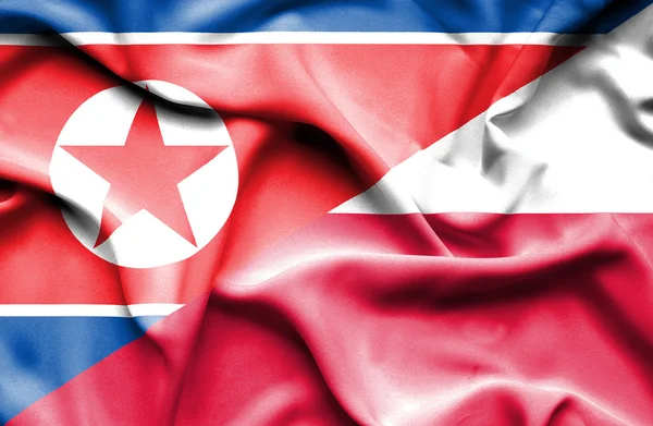 Polen och Nordkorea viftande flagga — Stockfoto