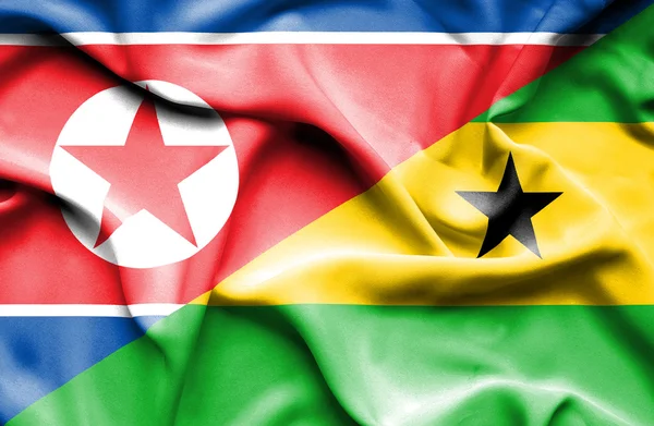Flagge schwenkend von sao tome und principe und Nordkorea — Stockfoto