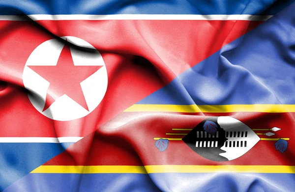 Drapeau agitant du Swazliand et de la Corée du Nord — Photo