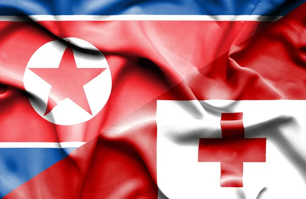 Tonga och Nordkorea viftande flagga — Stockfoto