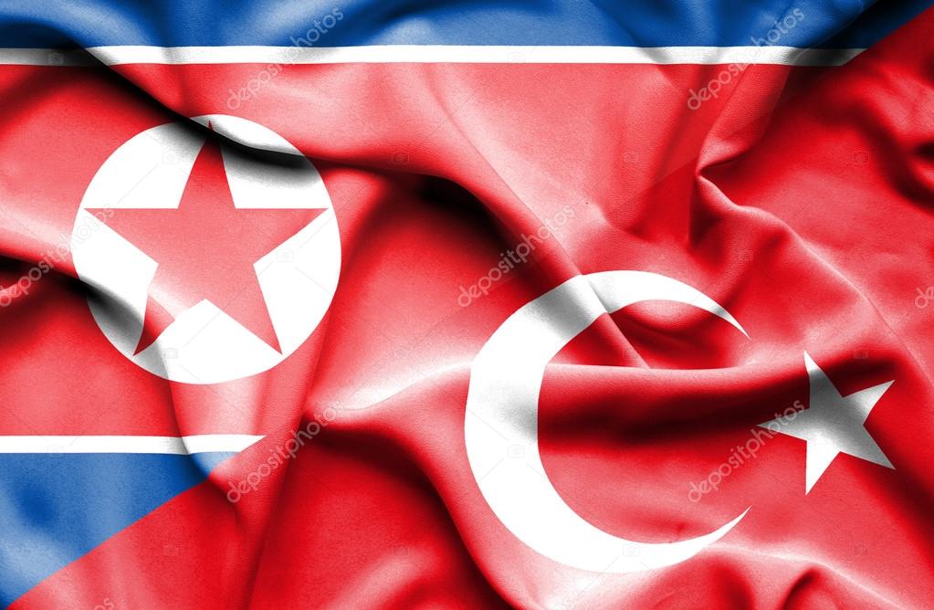 Waving flag of Turkey and North Korea