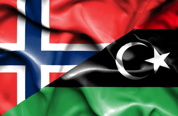 Vlající vlajka Libye a Norska — Stock fotografie