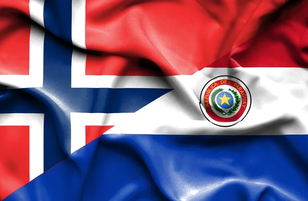 Bandeira ondulante do Paraguai e da Noruega — Fotografia de Stock