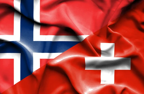 Bandera ondeante de Suiza y Noruega —  Fotos de Stock