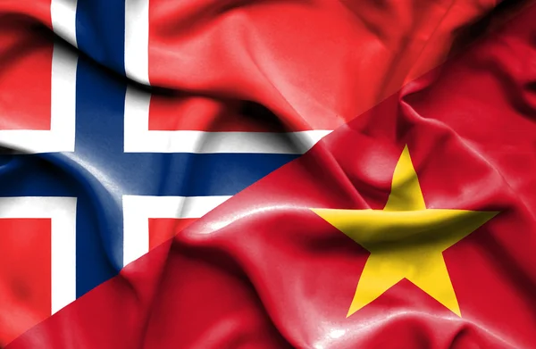 Wapperende vlag van vietnam en Noorwegen — Stockfoto
