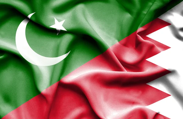 バーレーン、パキスタンの旗を振っています。 — ストック写真