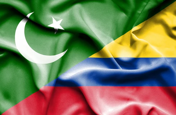 Waving flag of Columbia and Pakistan — Stock Photo, Image