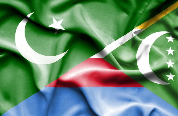 Waving flag of Comoros and Pakistan — Stock Photo, Image