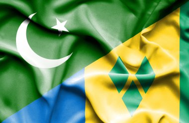 saint vincent ve Grenadinler andpakistan bayrağı sallayarak